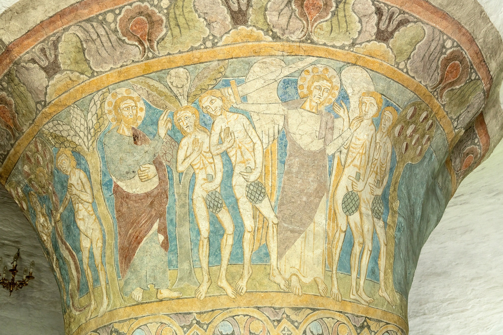 Romanesque frescoes on the central pillar of Nylars Church depicting scenes of the Fall
